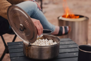 popcorn in pot by solo stove fire pit